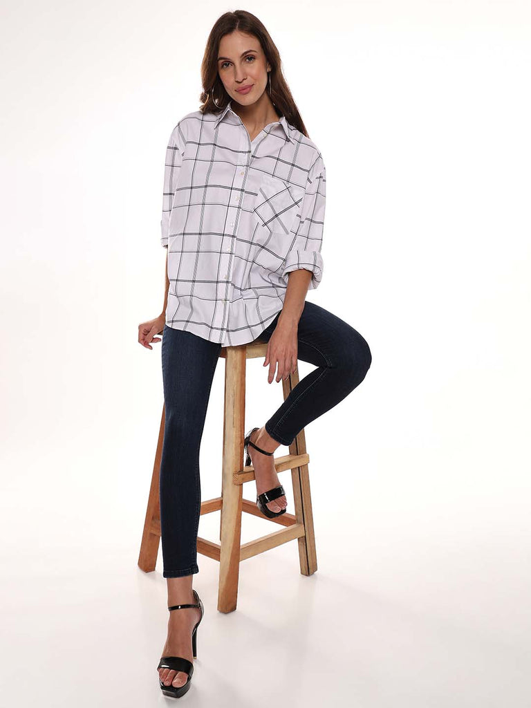 Alivia White Checks Oversized Shirt for Women from GAZILLION - Seated Stylised Look