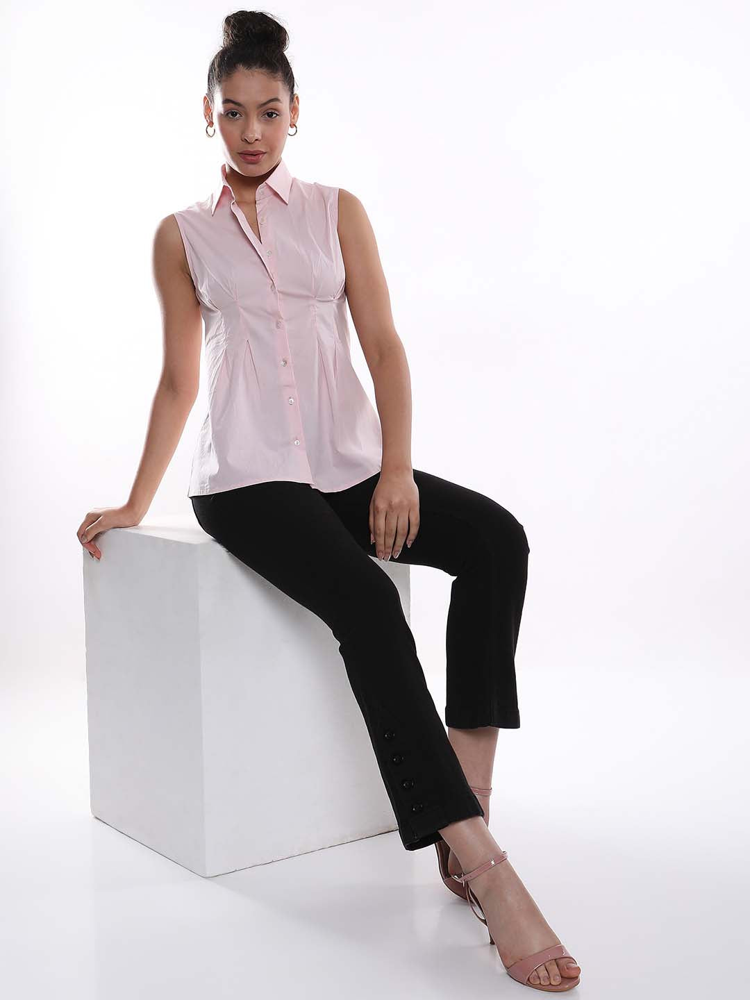 Amelia Baby Pink Sleeveless Cotton Shirt for Women - London Fit from GAZILLION - Seated Stylised Look